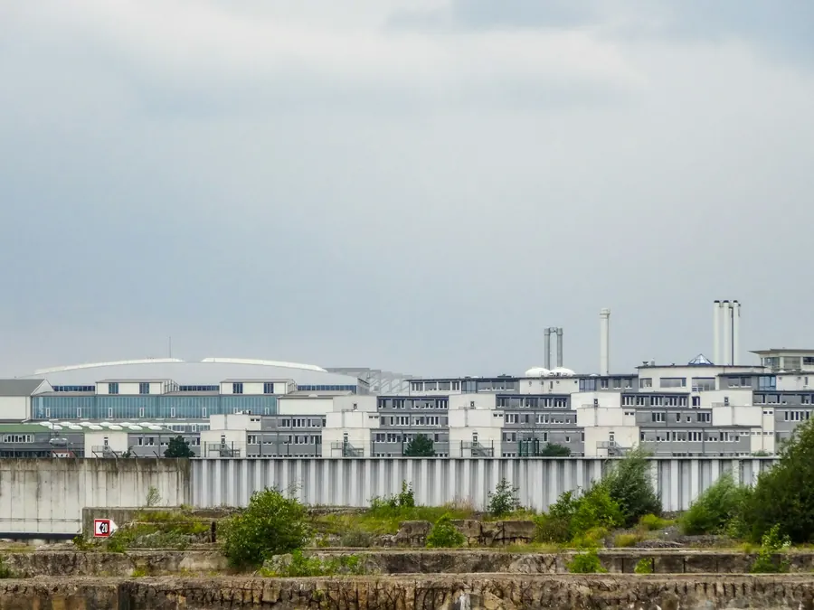 Industrial and warehouse buildings under a cloudy sky